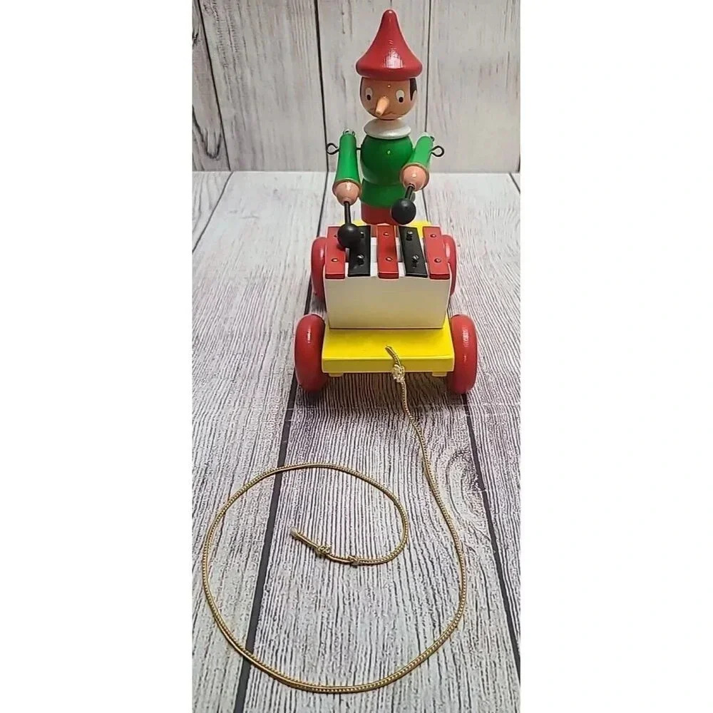 Vintage Unbranded Wooden Pinocchio Pull Toy Figure Yellow Red Green 7.5"